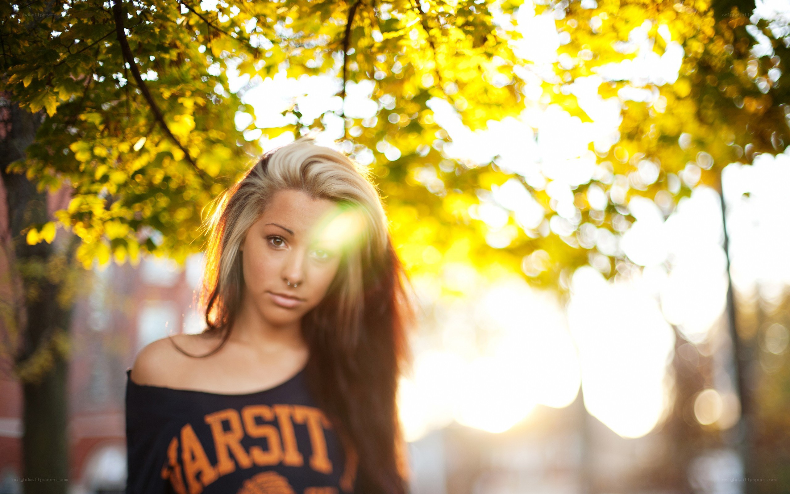woman under autumn trees