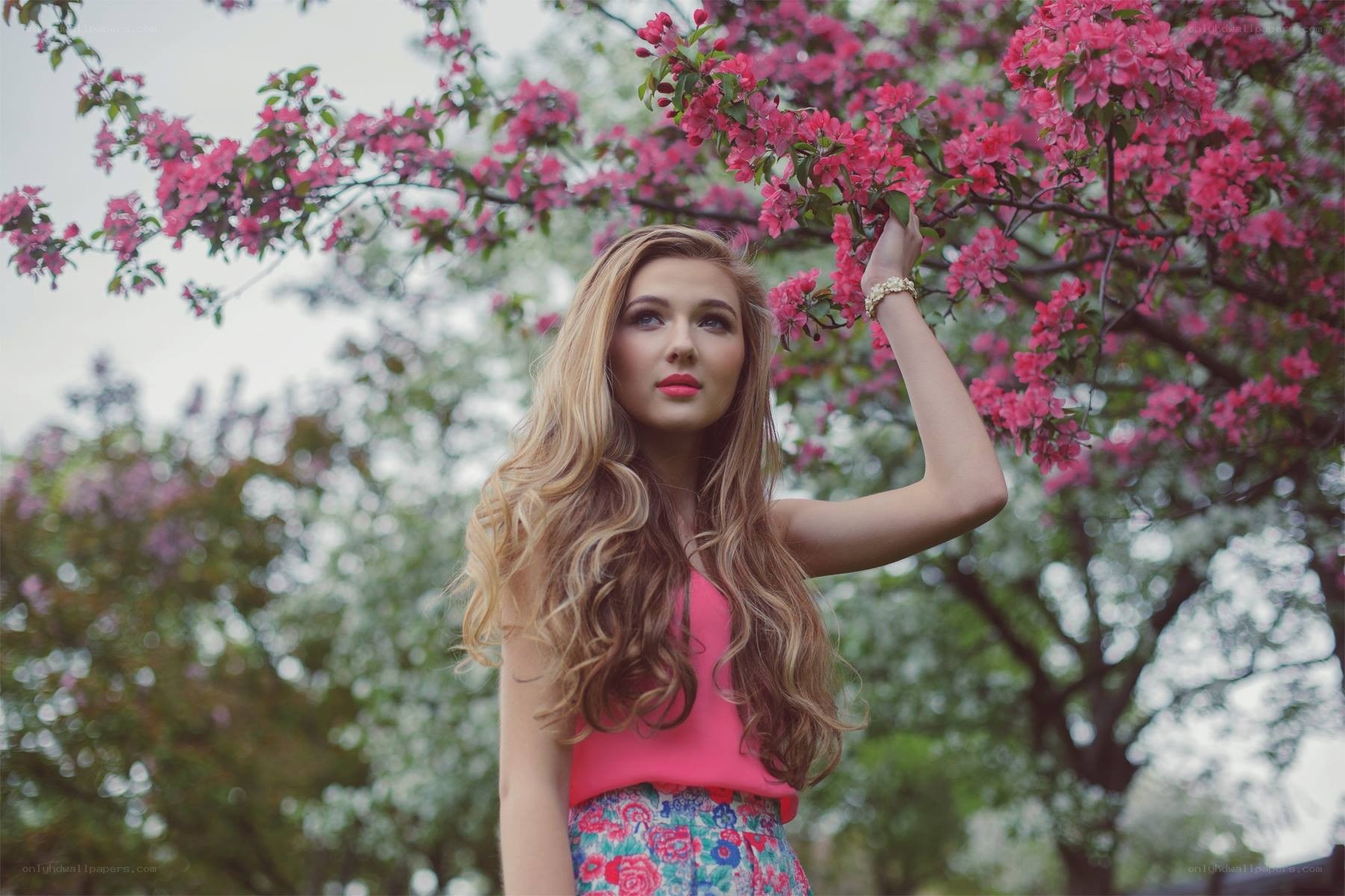 woman under blooming tree