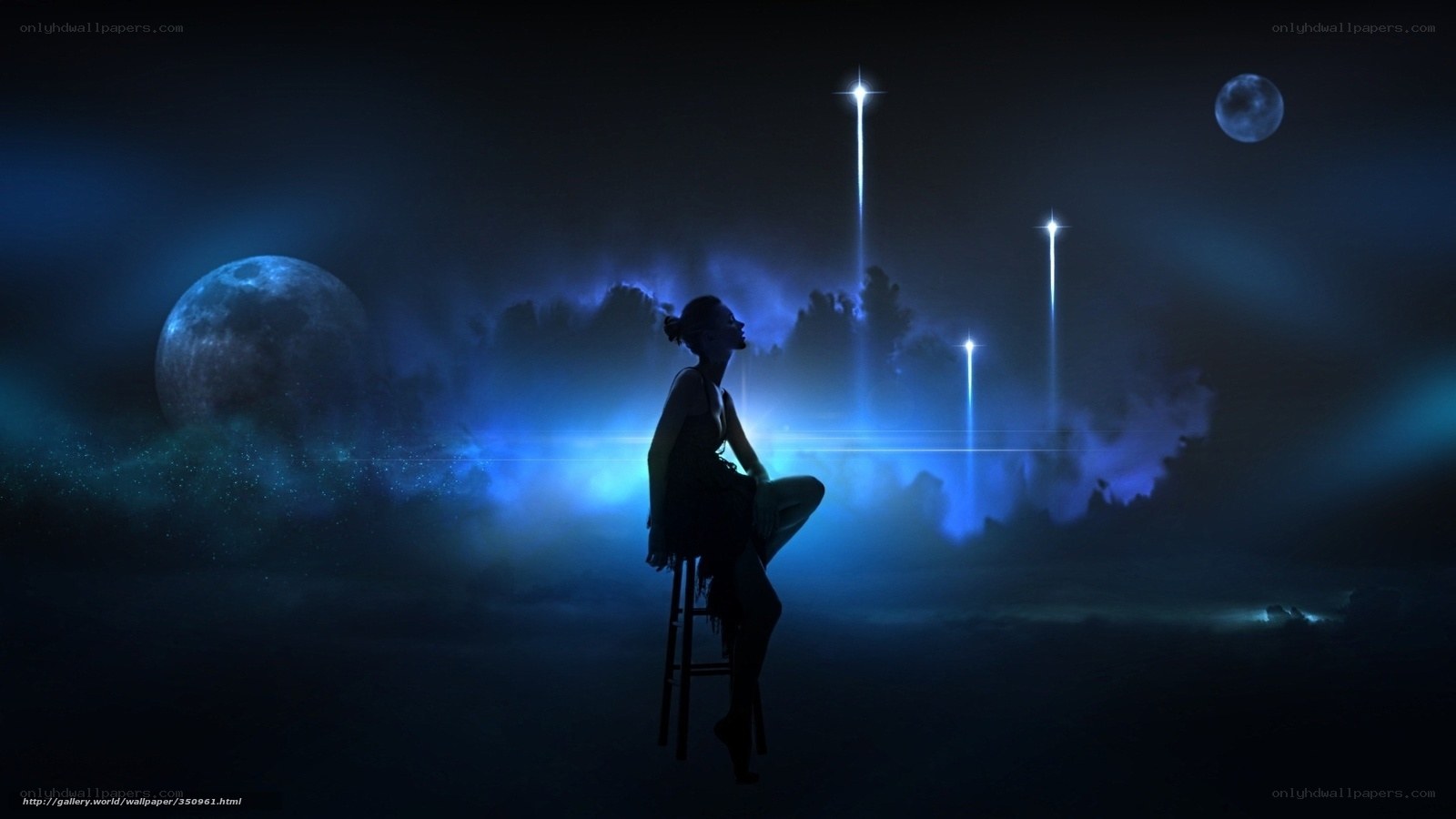 woman under celestial lights