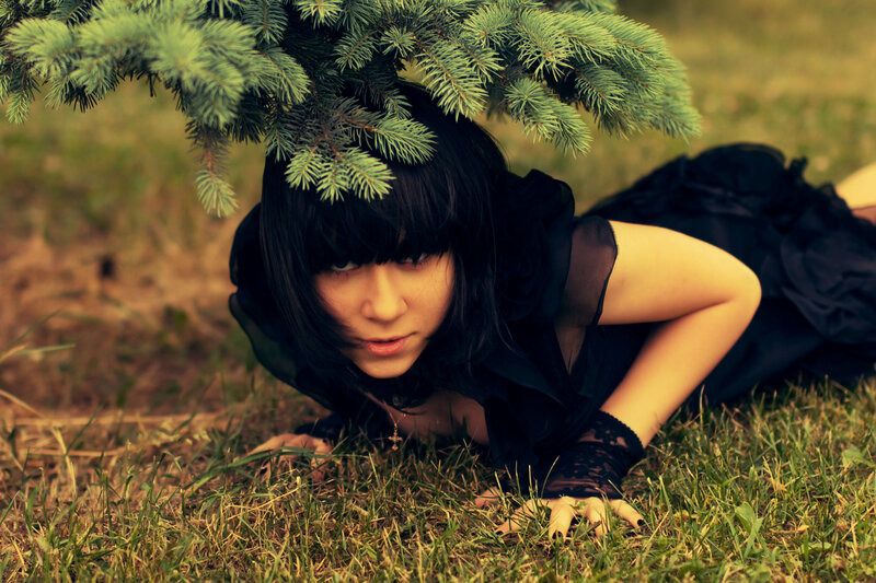 woman under pine tree