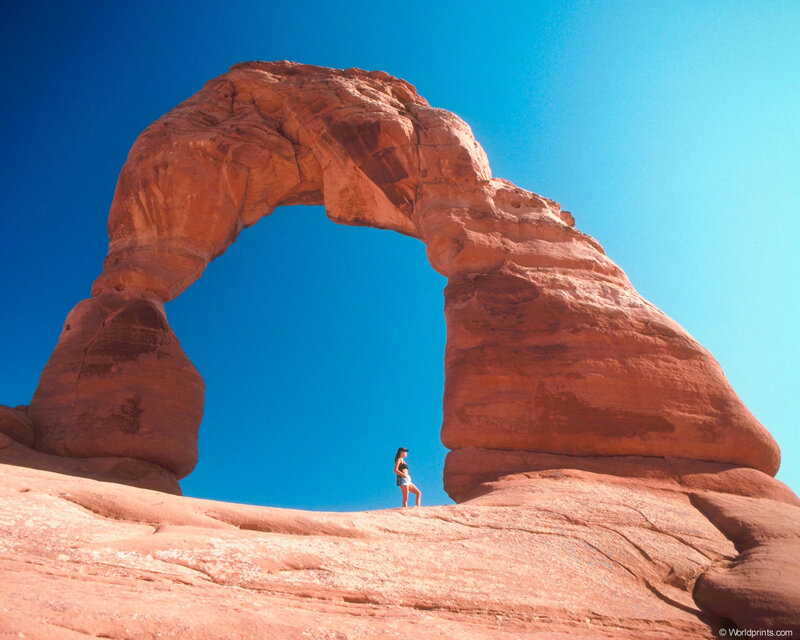 Woman under Rock Arch