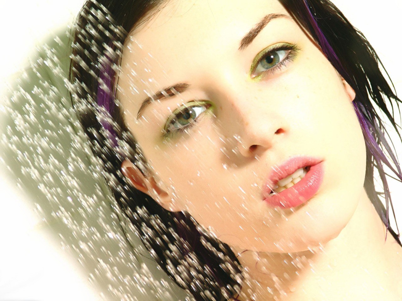woman under shower spray