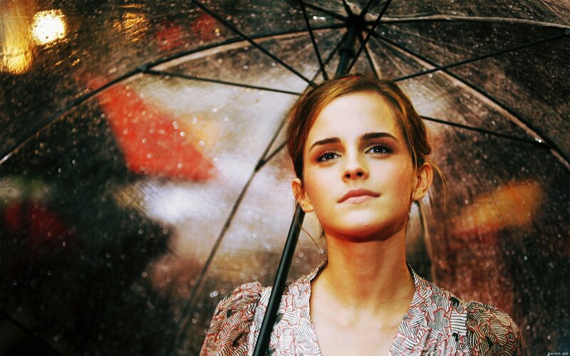 woman under umbrella in rain