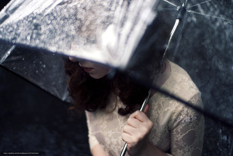 woman under umbrella in rain