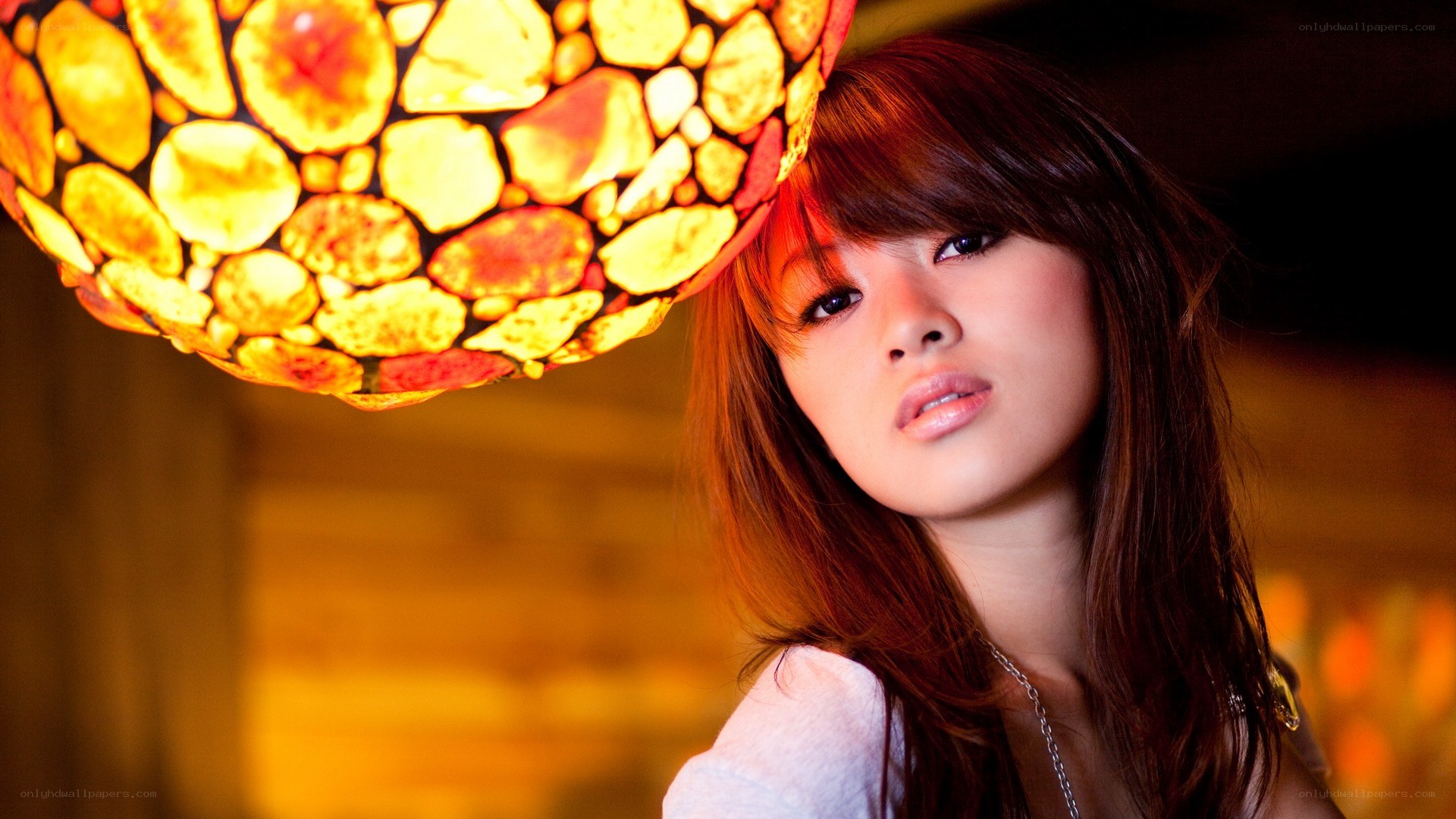 woman under warm lamp