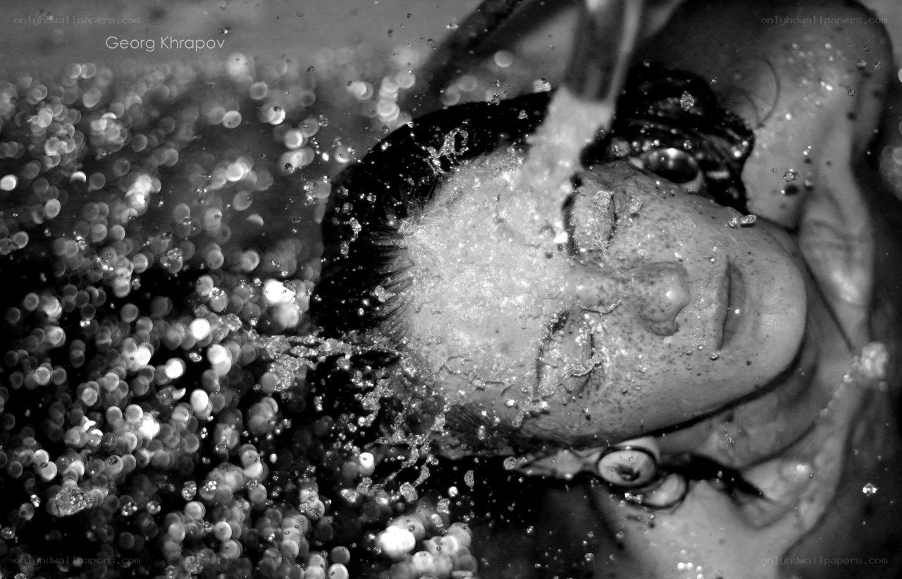 woman under water stream