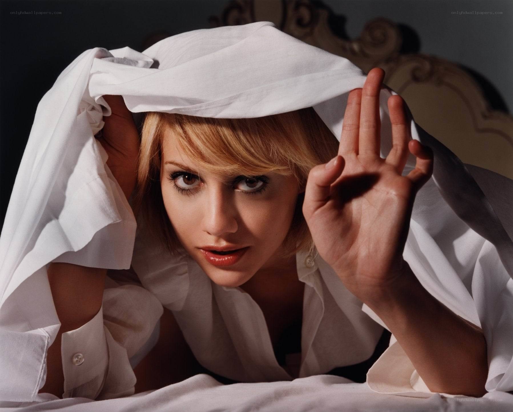 woman under white sheet