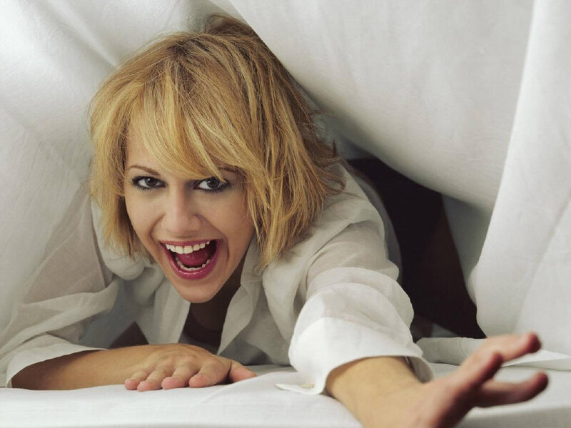 Woman under White Sheets