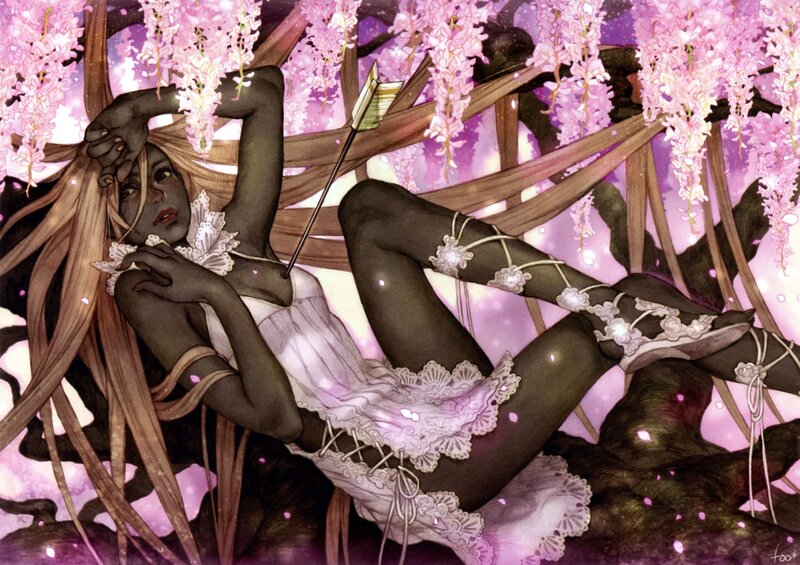 woman under wisteria blossoms