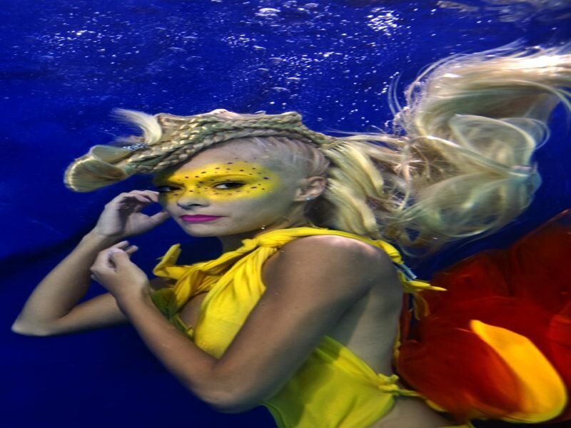 Woman Underwater in Costume