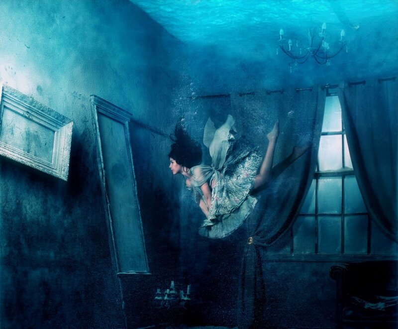 Woman Underwater in Room