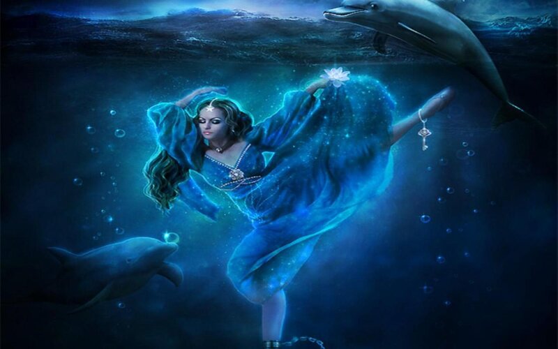 Woman Underwater with Dolphins — Blue