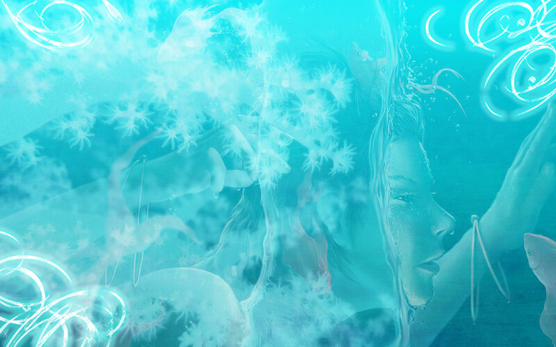 woman underwater with fish
