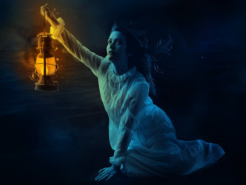 Woman Underwater with Lantern