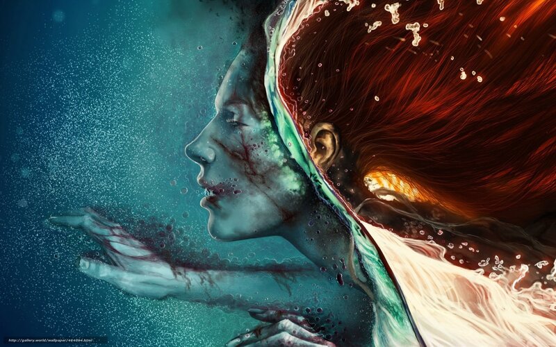 woman underwater with red hair