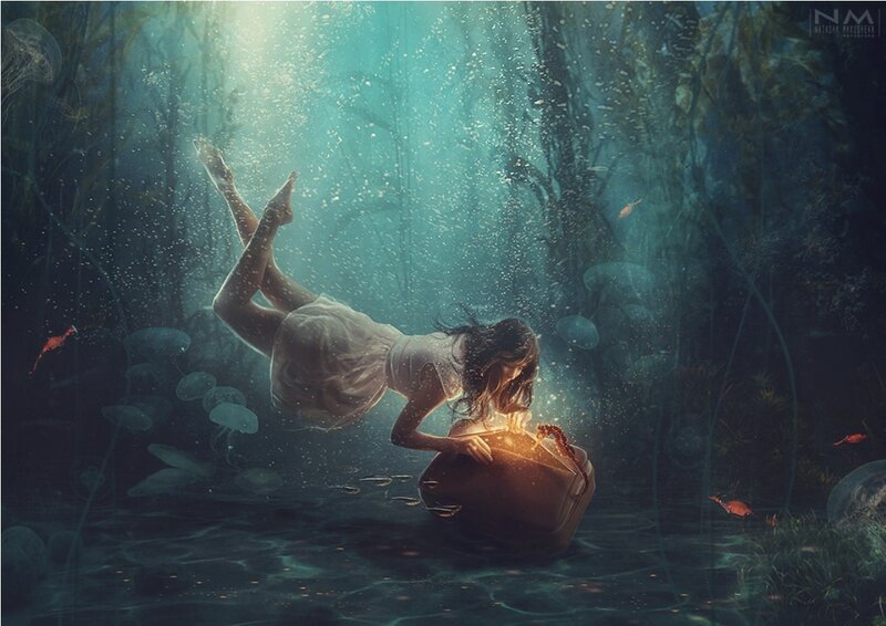 Woman Underwater with Suitcase