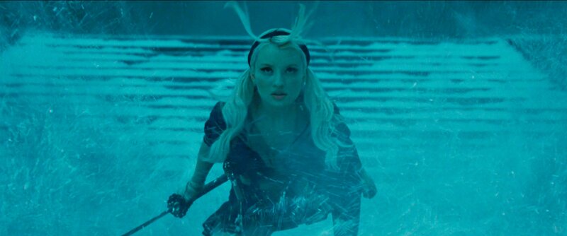 woman underwater with sword