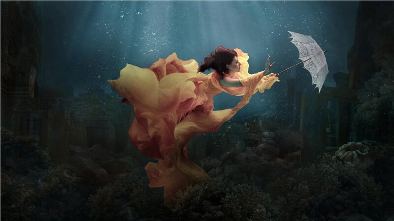 Woman Underwater with Umbrella