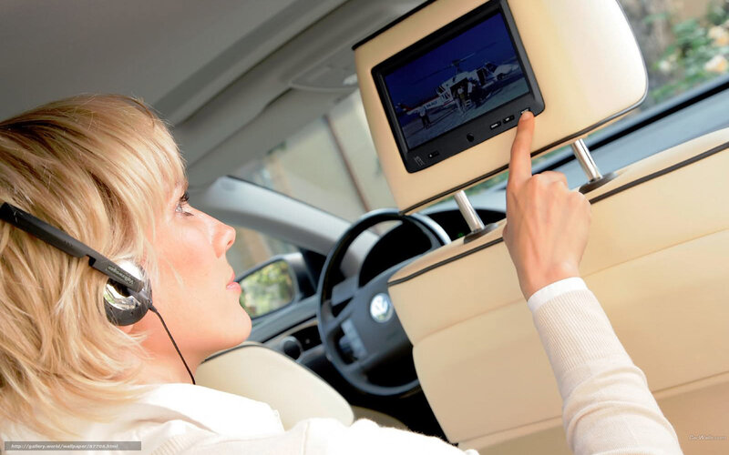 woman using car entertainment system