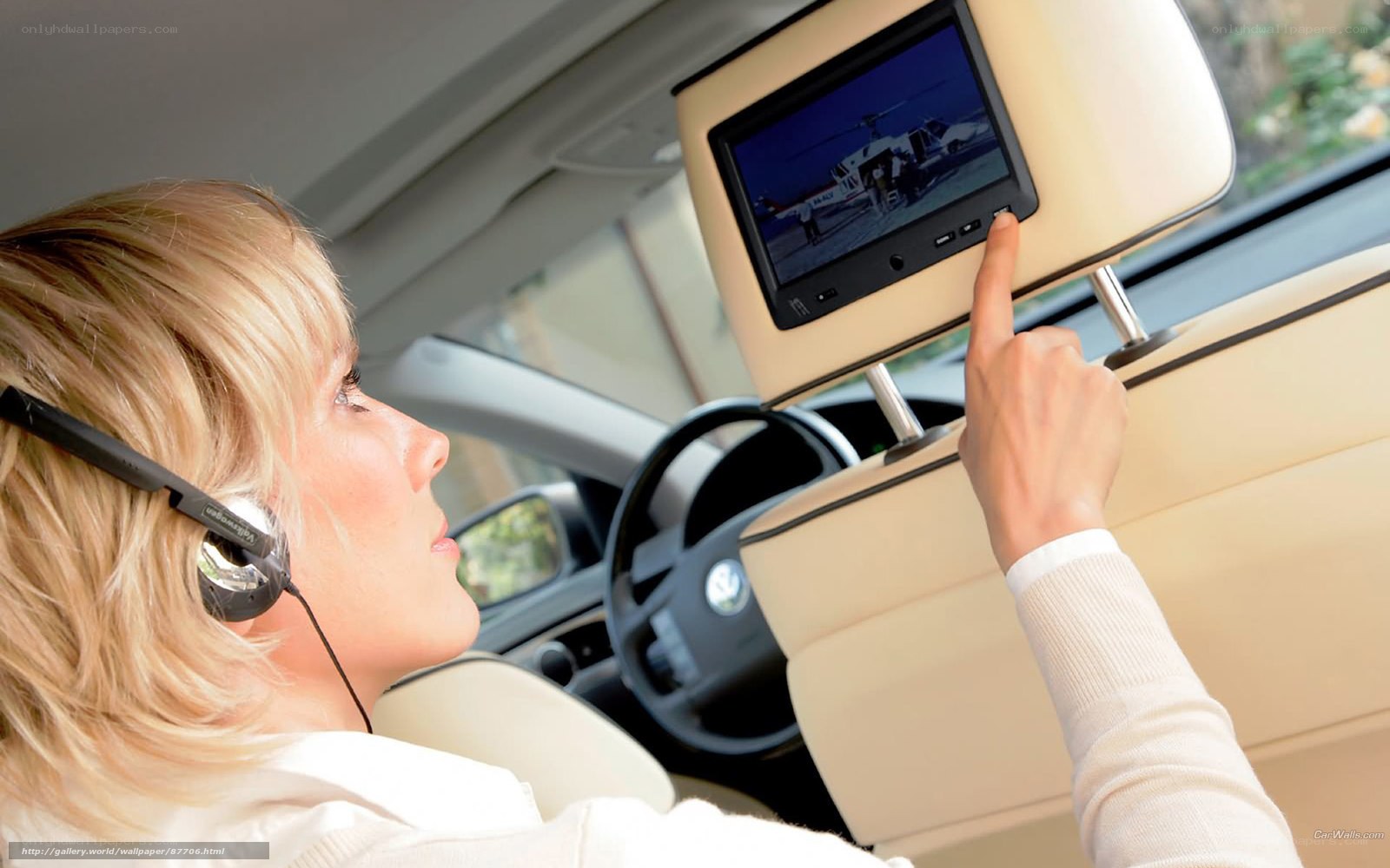 woman using car entertainment system