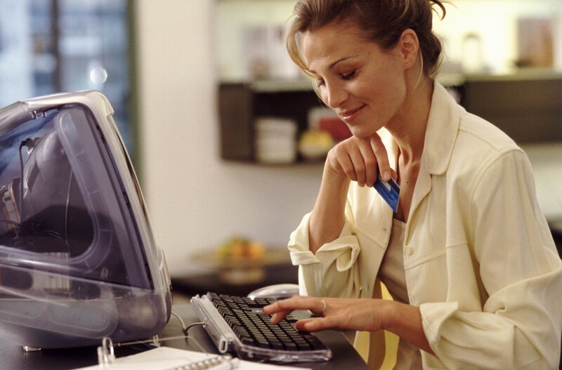 woman using computer at desk