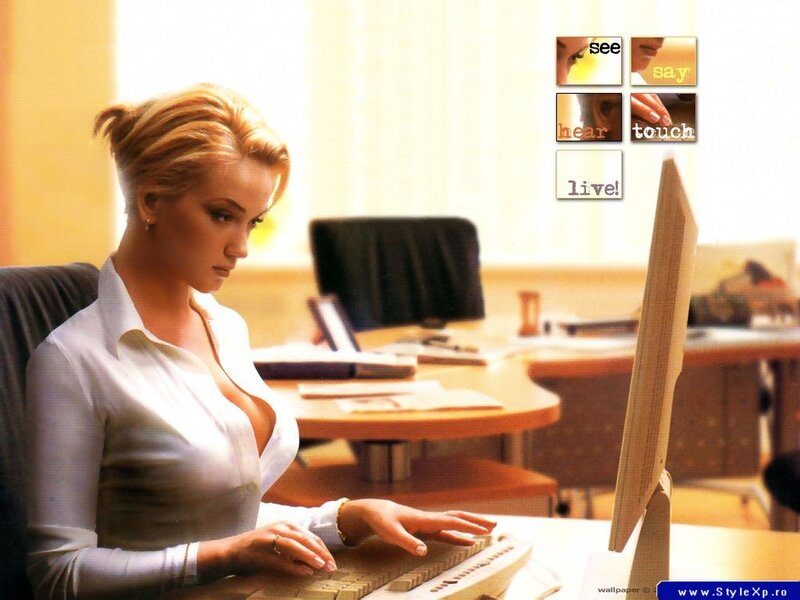 Woman Using Computer — White, Focused