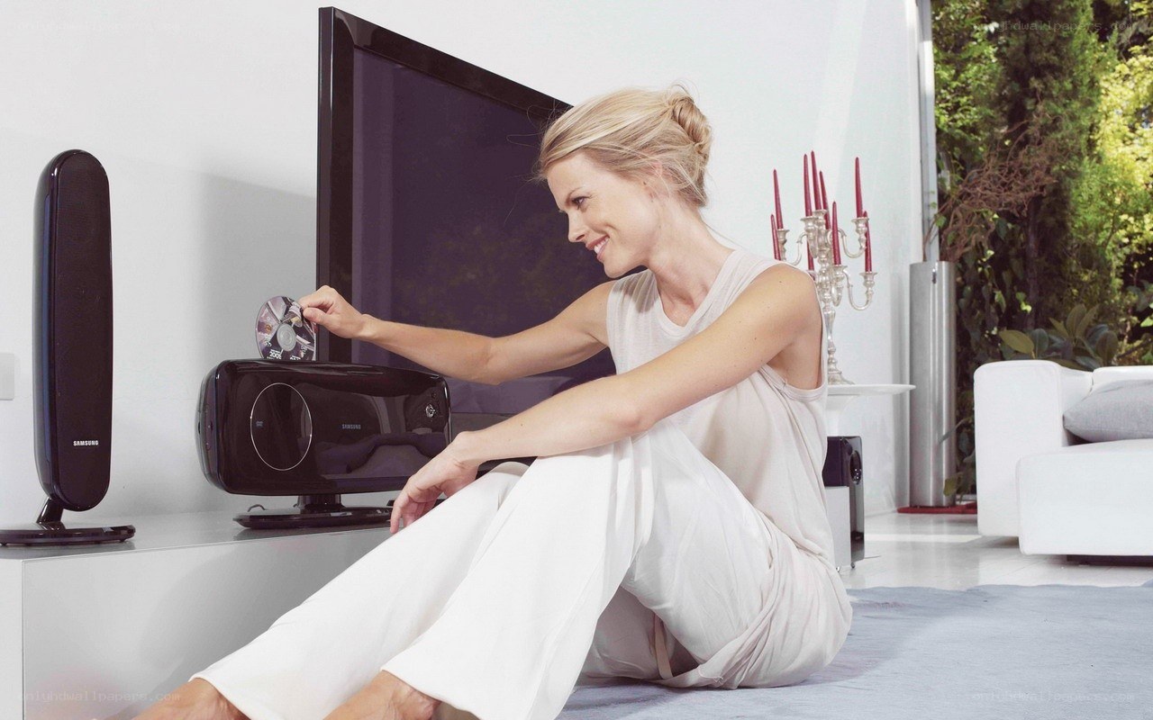 woman using home entertainment system