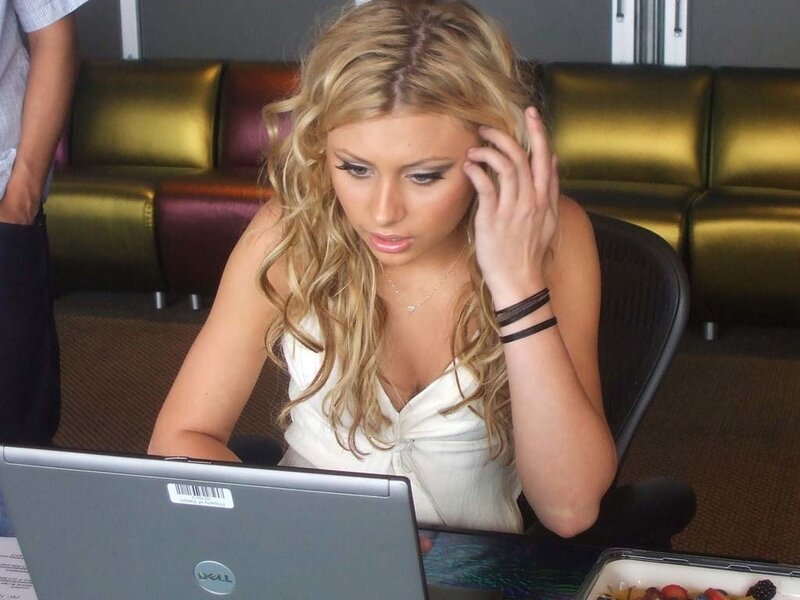 woman using laptop at desk