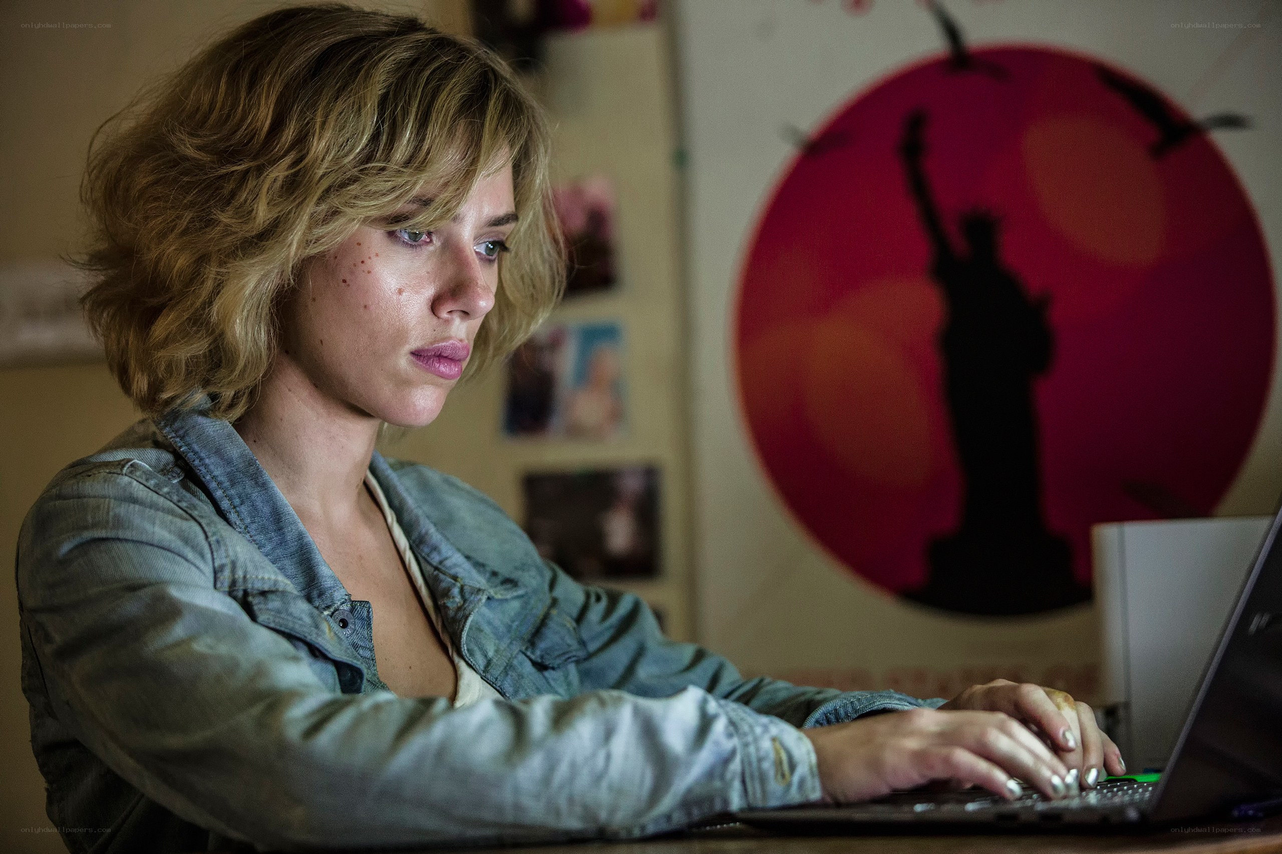 woman using laptop at desk