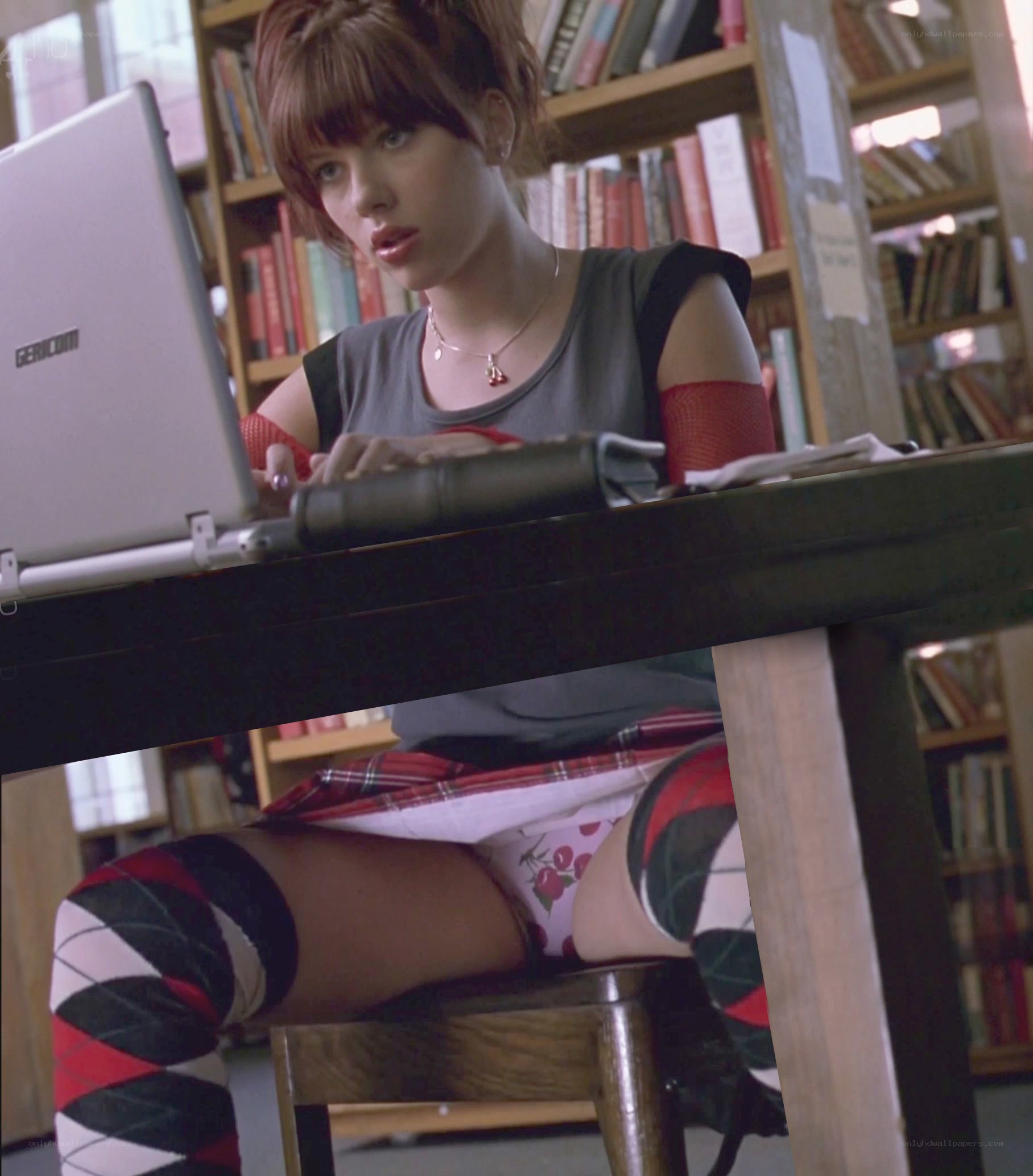 woman using laptop in library
