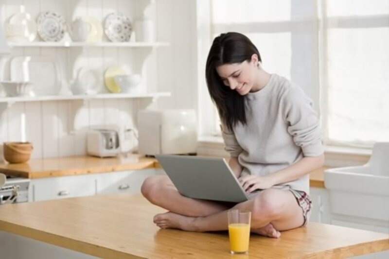 Woman Using Laptop — White, Calm, Morning