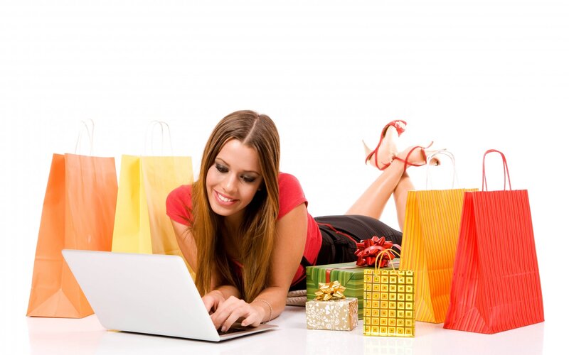 Woman Using Laptop — White, Relaxed, Photograph, Shopping Bags