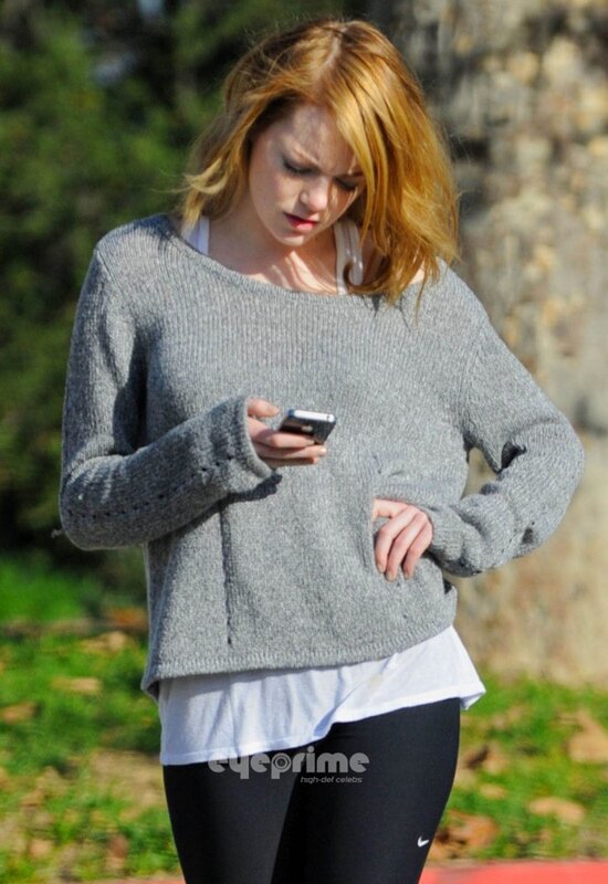 woman using phone outdoors