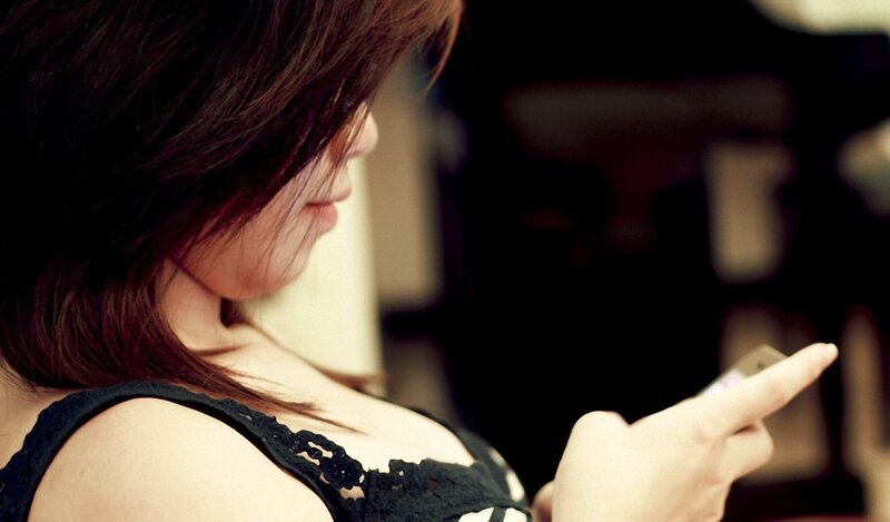 Woman Using Smartphone — Brown, Calm