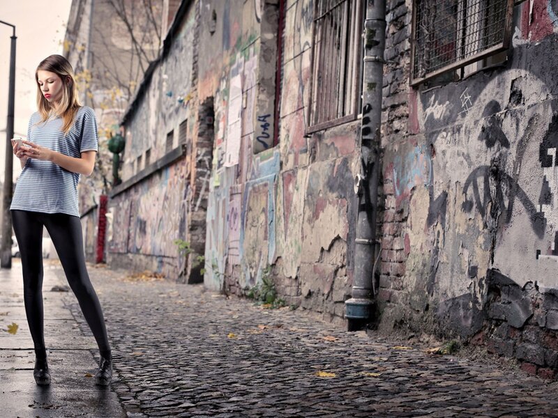 Woman Using Smartphone — Gray, Urban