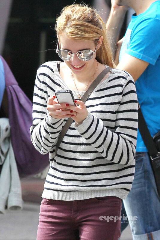 woman using smartphone outdoors