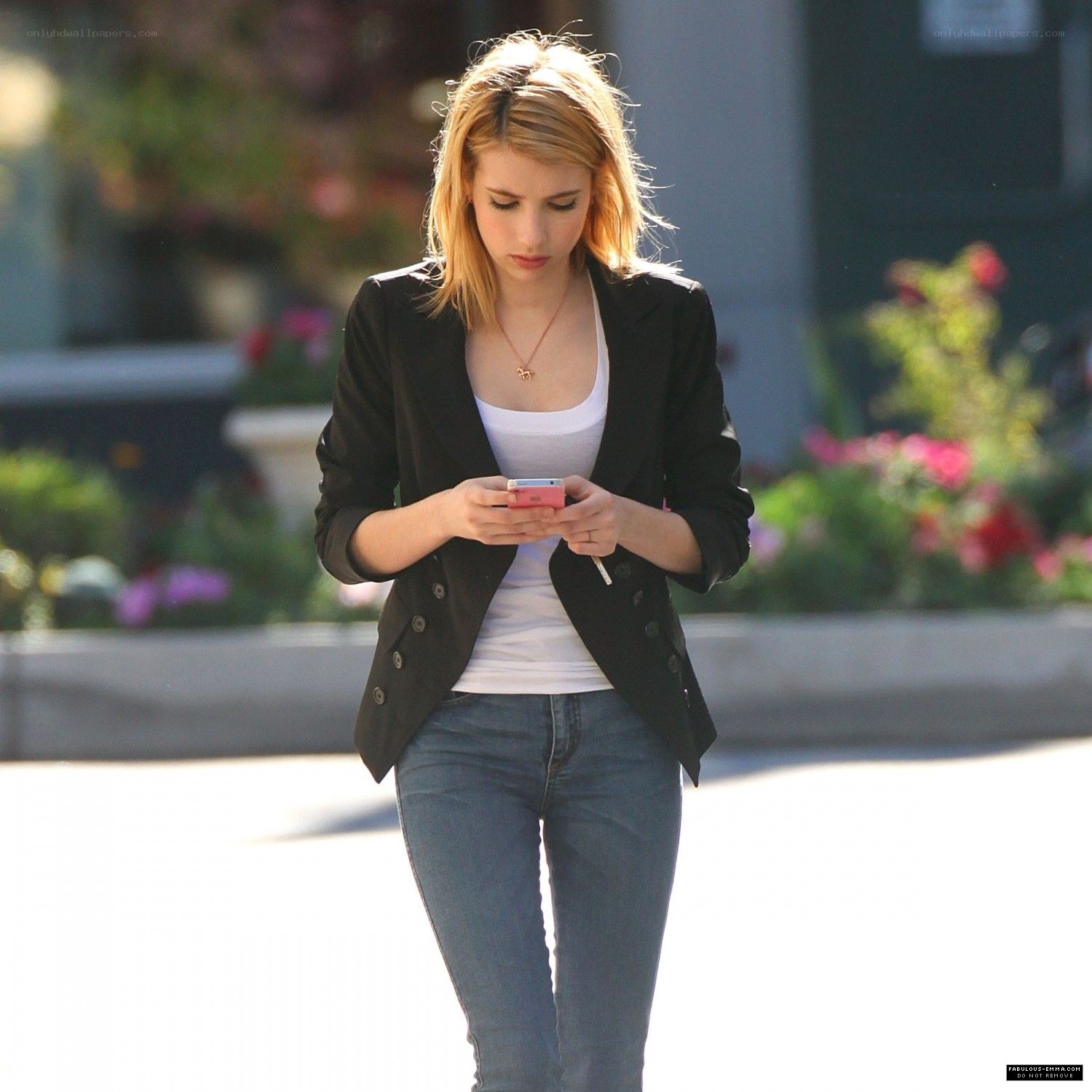 woman using smartphone outdoors