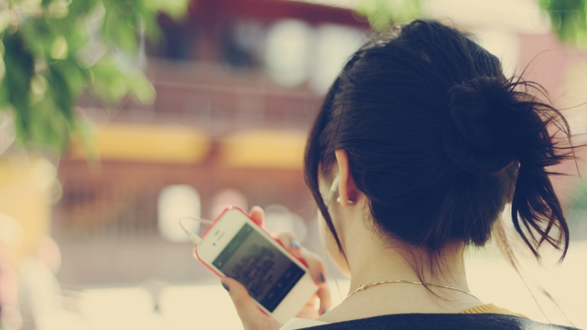 woman using smartphone outdoors