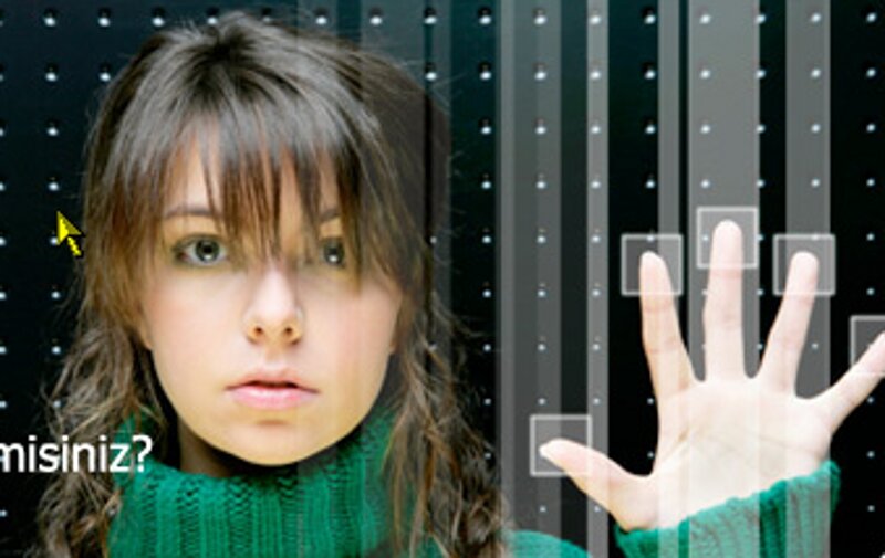 woman using touch screen interface
