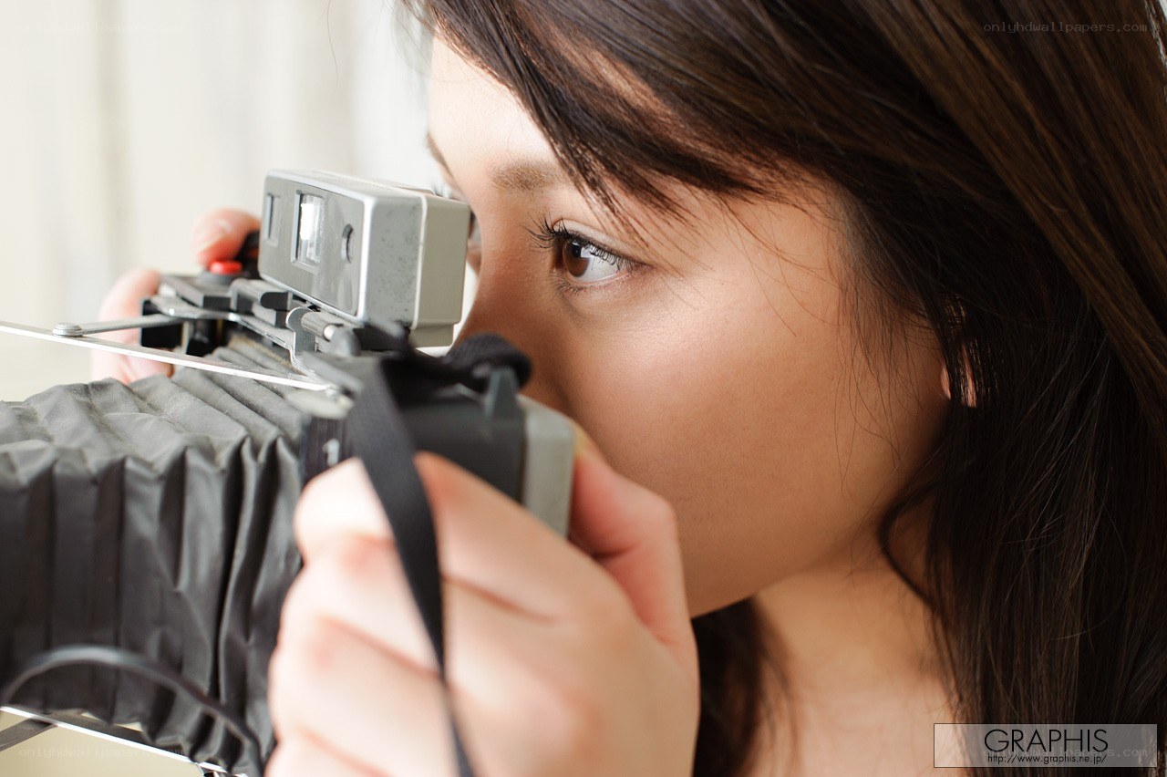 woman using vintage camera
