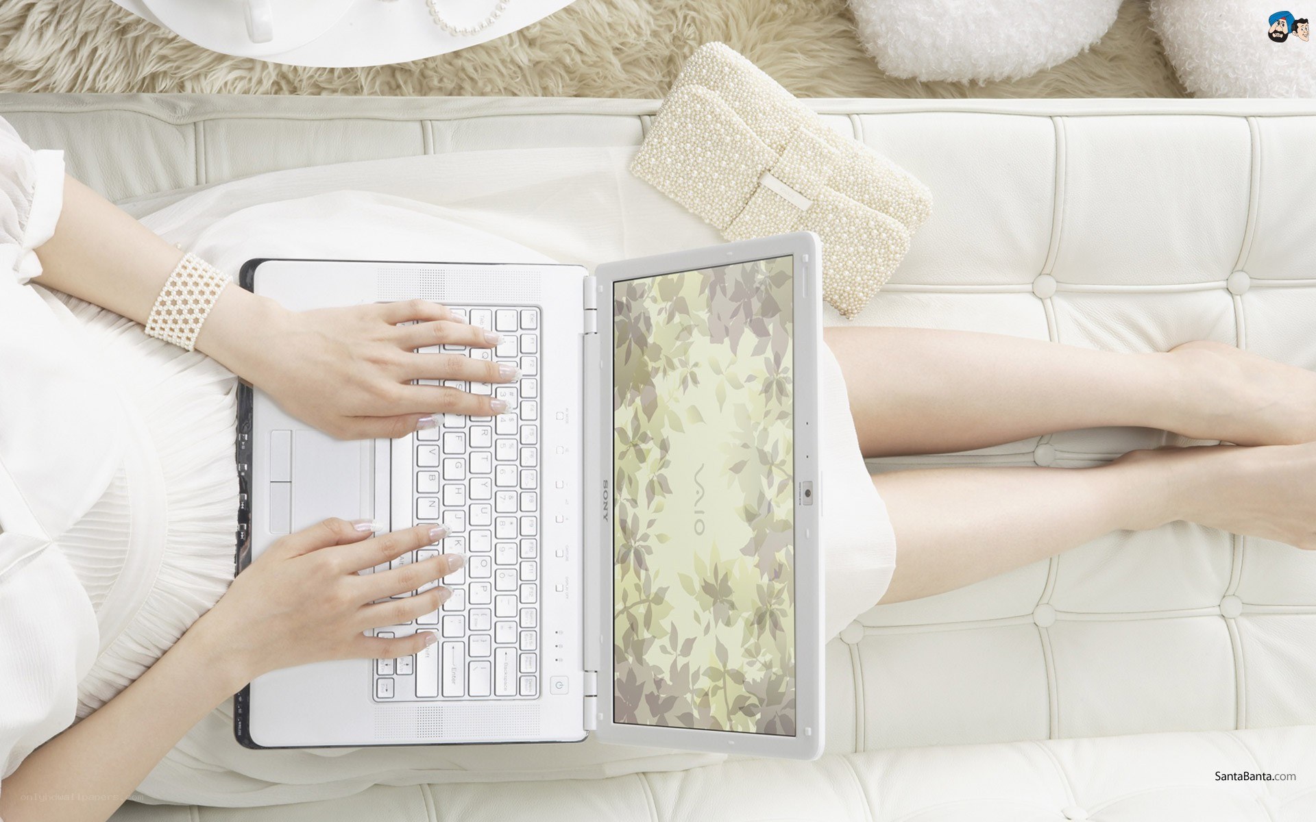 woman using white laptop