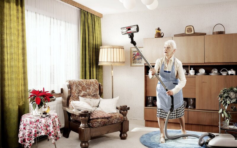 Woman vacuuming living room