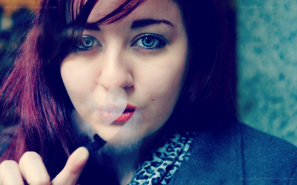 woman vaping indoors