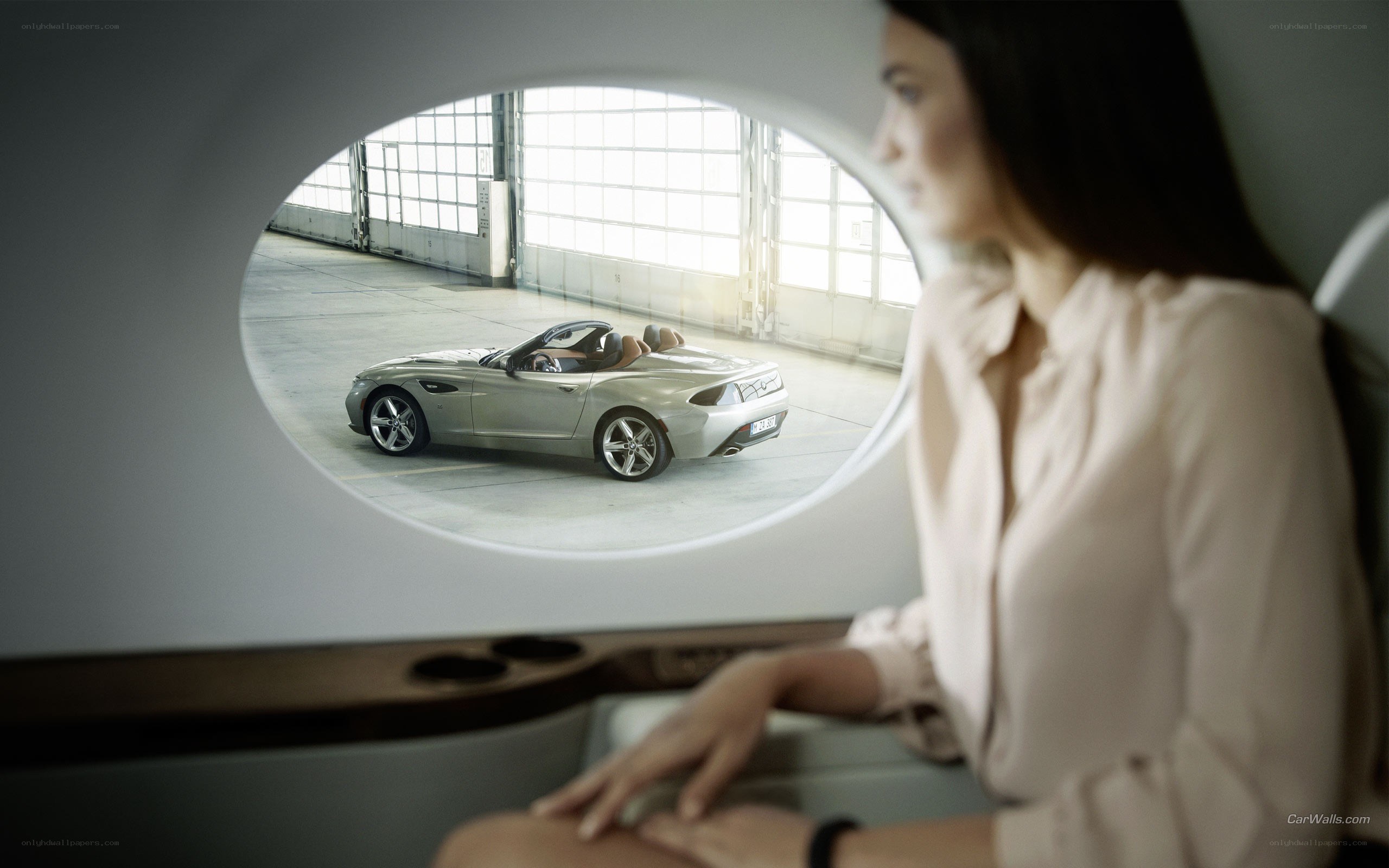 Woman viewing car through window
