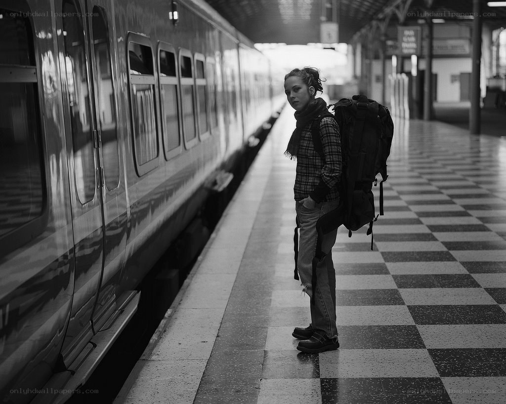 Woman waiting at train station