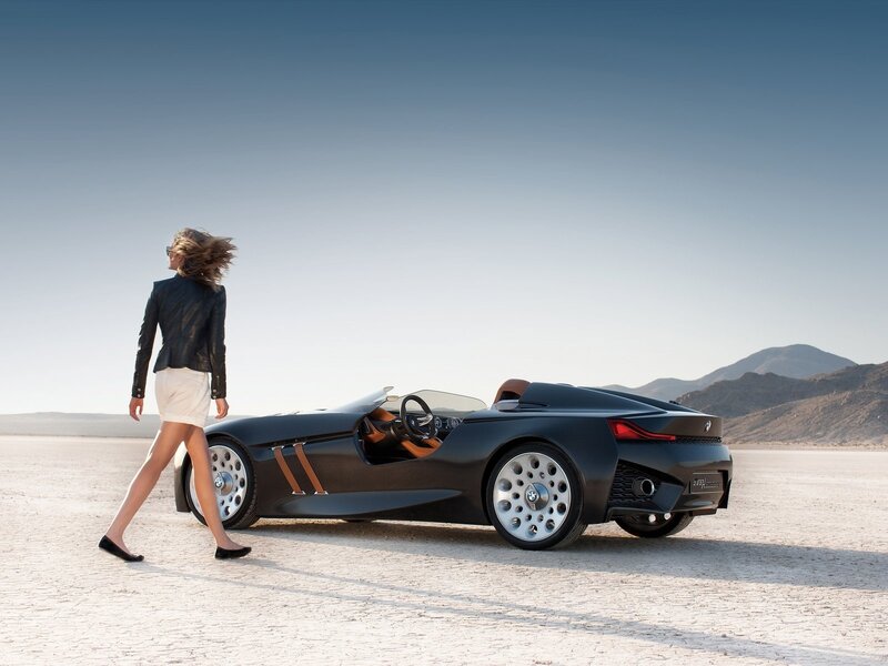 Woman Walking Beside Car — Black
