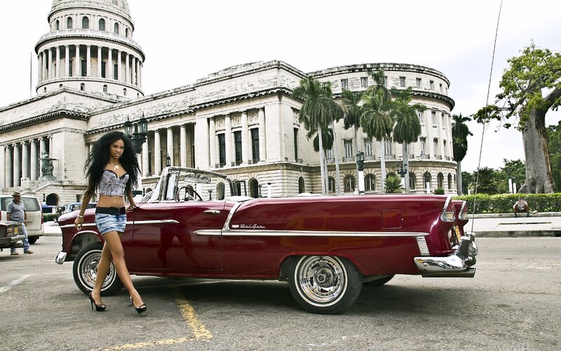 Woman Walking Beside Car — Red