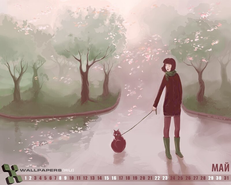 Woman walking cat in park