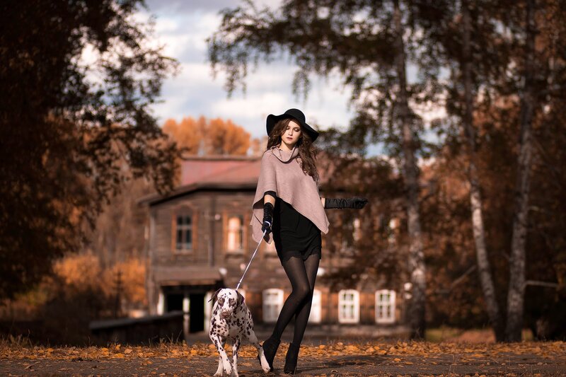 Woman Walking Dalmatian