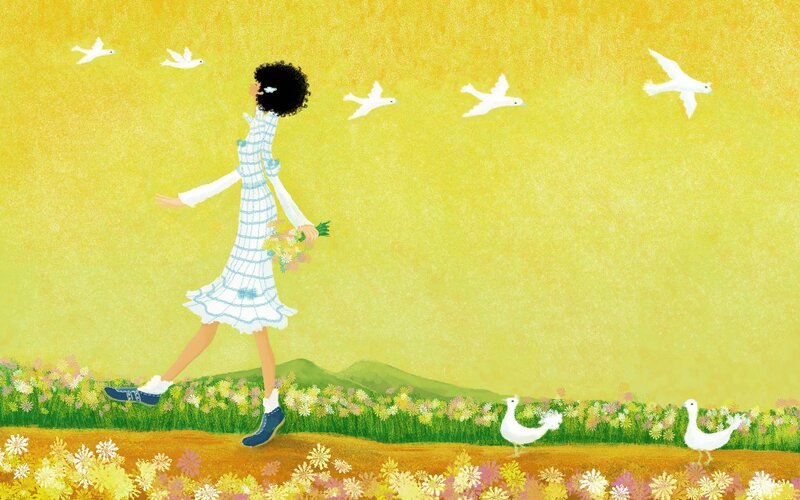 Woman walking in a field